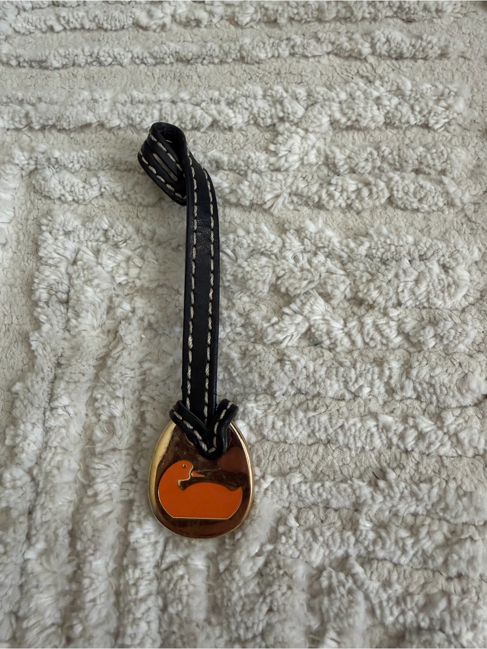 Dooney & Bourke Black Leather Strap Keychain with Orange Duck Charm